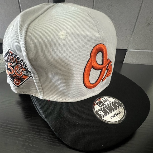 New Era Other - Gray and Black 9FIFTY Snapback Cap with Orange Logo